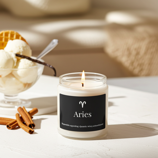 Candle labeled 'Aries' with ice cream and waffles in the background