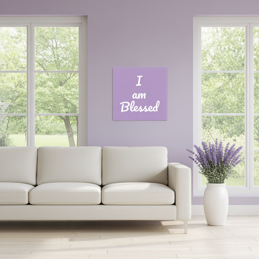 Living room with a white sofa, lavender plant, and 'I am Blessed' canvas on a purple wall.