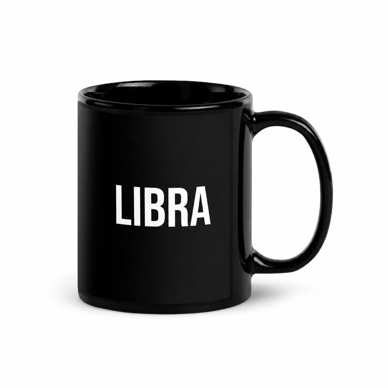 Black mug with 'LIBRA' printed on it against a white background