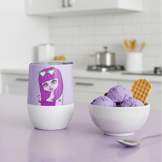Mini Purple tumbler with Aquarius character on a kitchen counter next to a bowl of purple ice cream.
