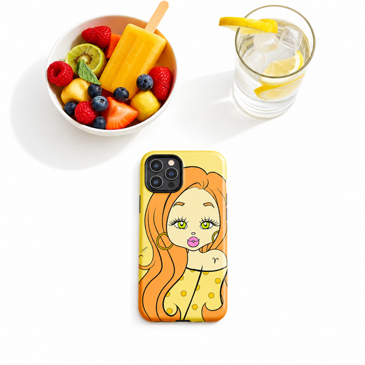 A yellow phone case featuring an Aries character design, shown on a white background with a bowl of fruit and a glass of water as lifestyle props.