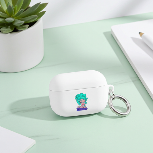 White airpod case with a Capricorn character design on a light green surface with a plant in the background
