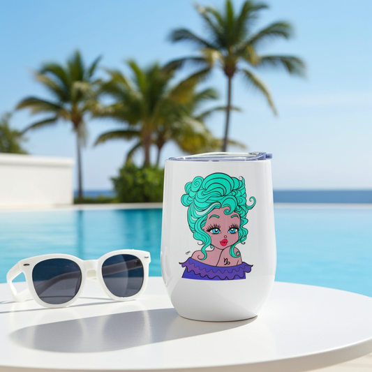 White tumbler with a capricorn design of a woman with green hair and sunglasses on a table by a pool with palm trees in the background.