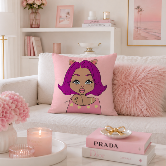 A pink square throw pillow featuring a leo character, styled on a white sofa in a bright, pink-themed living room.