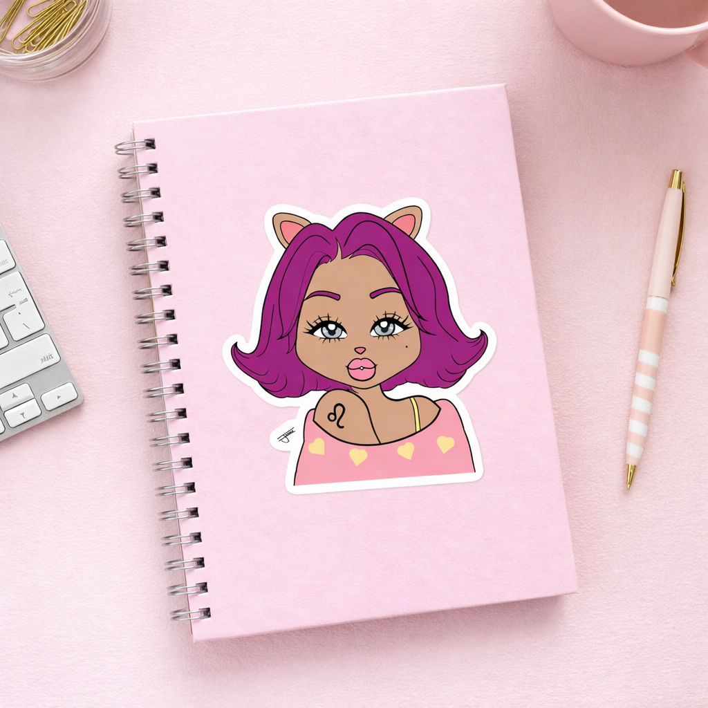Pink notebook with a sticker of a Leo character with purple hair on a pink surface with stationery items.