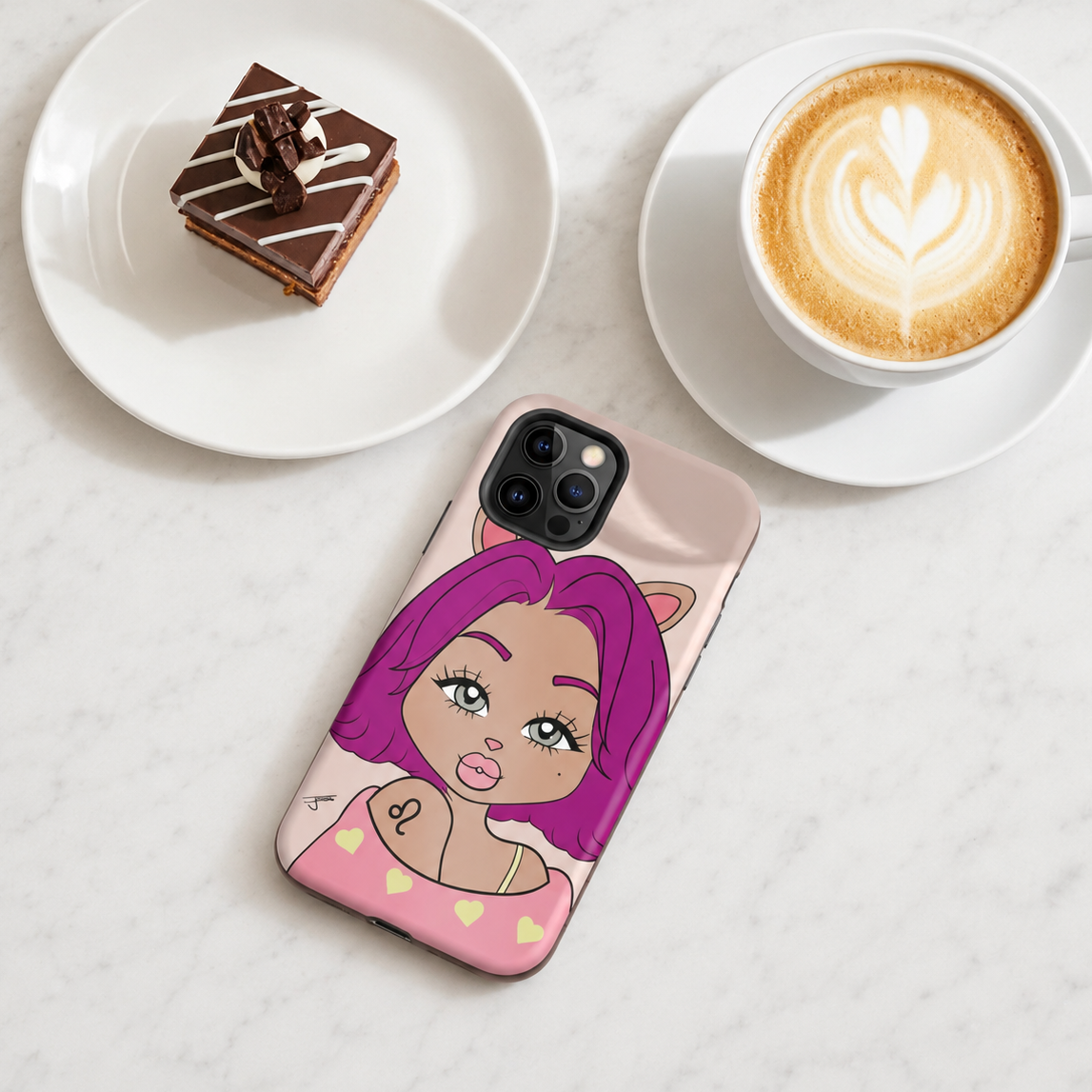 Phone case with Leo character design on a table with a cup of coffee and dessert.