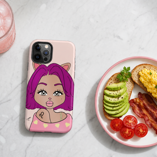 A pink phone case featuring a leo character design, shown on a smartphone. The phone case is photographed in a styled flat-lay setting on a light marble surface next to a plate of breakfast (toast with scrambled eggs, bacon, avocado, and tomatoes) and a glass of pink iced drink.