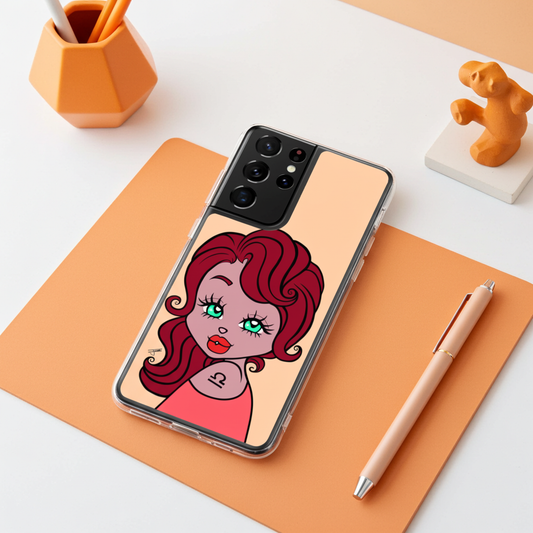 Phone case with a cartoon design of a Libra character on an orange mat with a pen and small decorative items.
