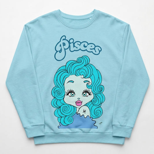 A light blue crewneck sweatshirt featuring a cartoon graphic of a Pisces zodiac character with bright blue hair and the word 'Pisces' written above in a retro font.