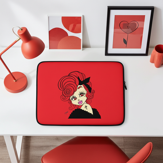 Scorpio laptop sleeve with a Scorpio character design on a white desk with decorative items.