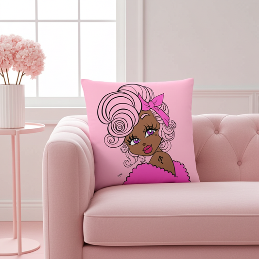 Pink pillow with cartoon character on a pink couch in a bright room