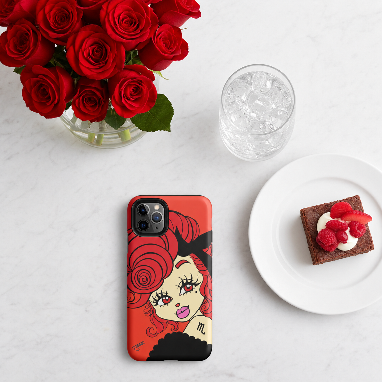 Phone case with a Scorpio character design on a table with red roses, a glass of water, and a dessert.