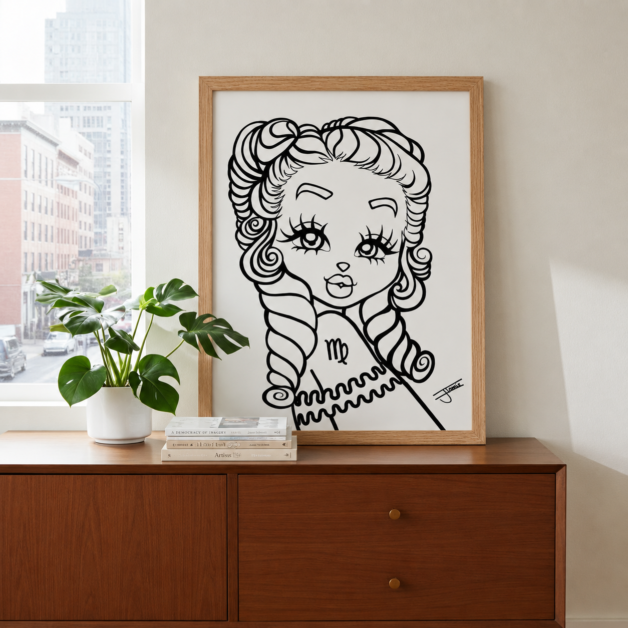 Framed black and white illustration of a Virgo character on a wooden dresser with a plant and books.