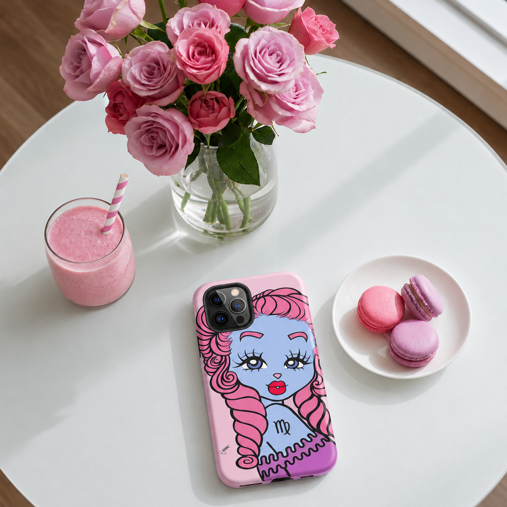Phone case with a Virgo character on a table with pink roses, a smoothie, and macarons.