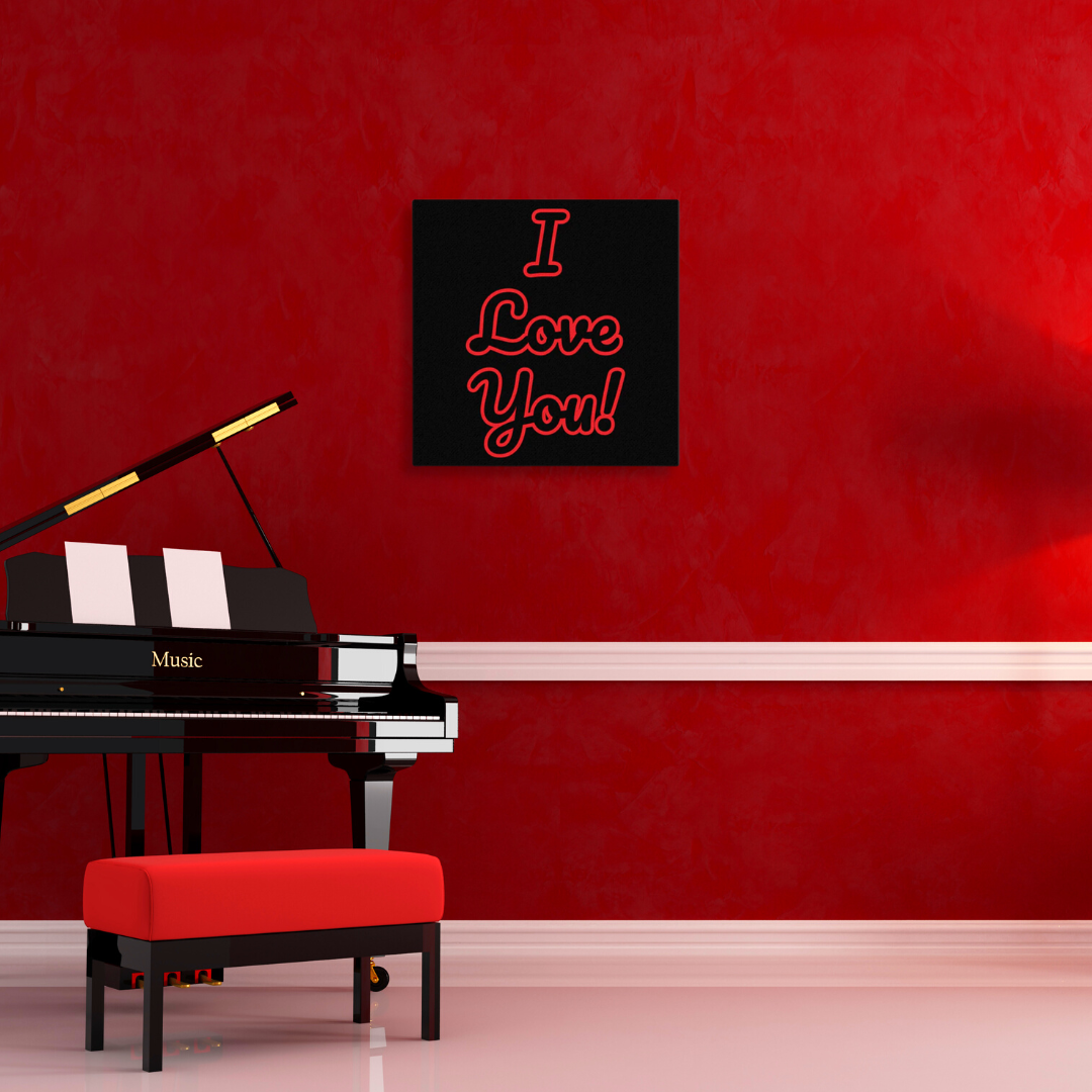 A canvas with the text 'I love you!' displayed on it, positioned above a piano in a room with a red wall and a red chair.