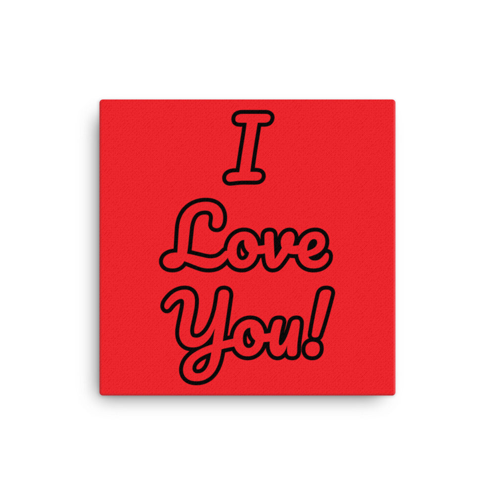 A red canvas wall art with the text 'I love you!' displayed on a white wall above a red couch, with black hanging lights and a white brick wall in the background.
